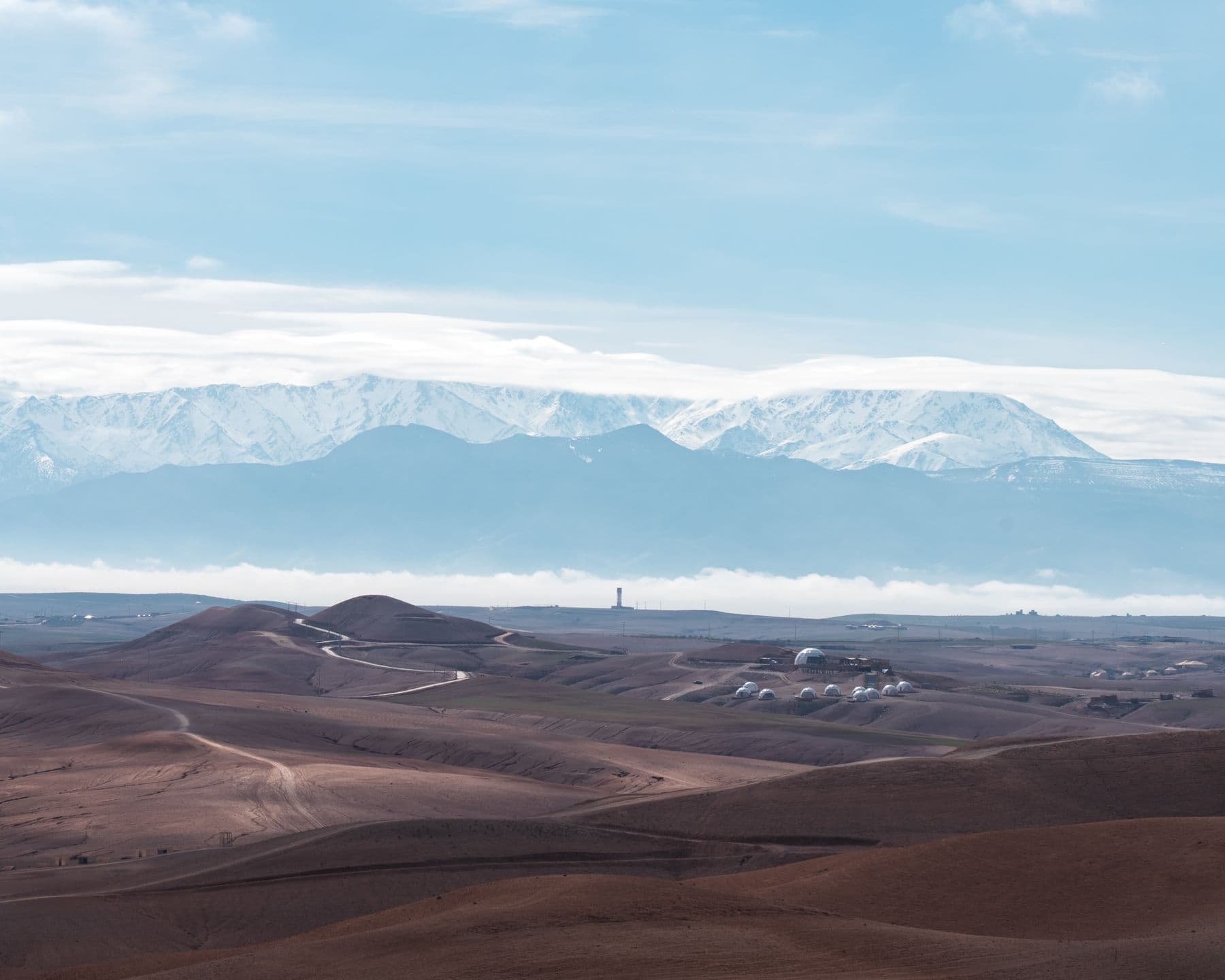 Rocky Agafay hills with the Atlas Mountains in the distance